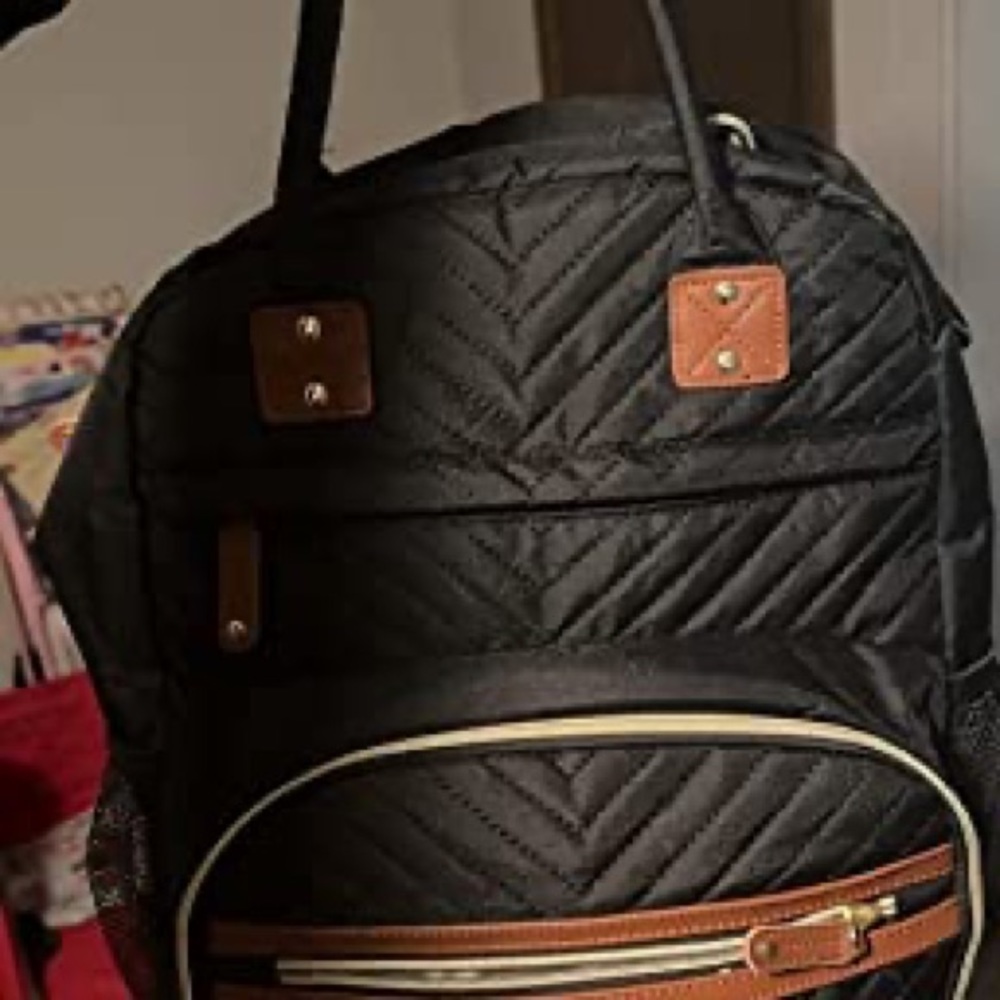 Stylish diaper baby bag available in black large size backpack for traveling.